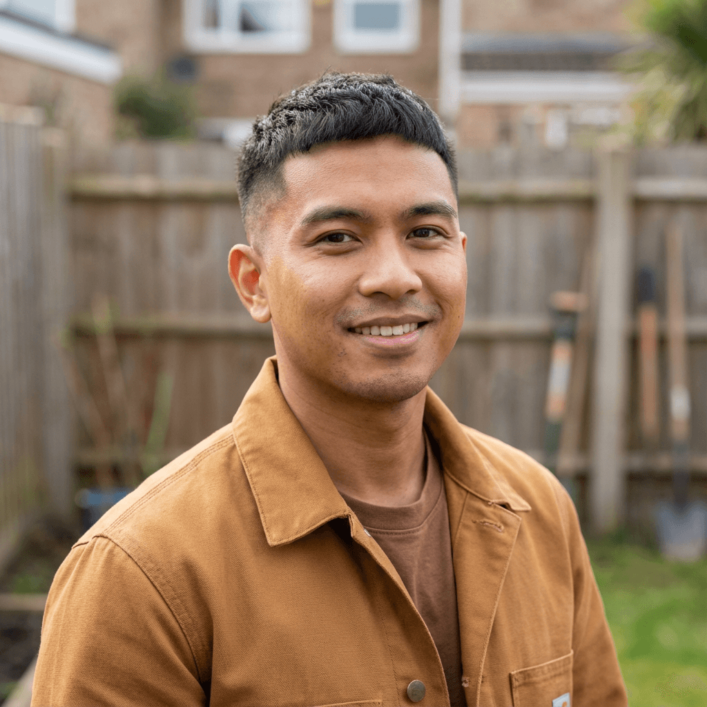Michael Tremblay, male homeowner in his late 40s, White, friendly approachable style, working in a garden
